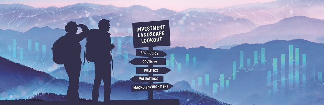 A silhouette of hikers looking out over what a sign indicates is an "investment landscape lookout" 